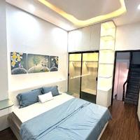 Nhỉnh 9 tỷ 27m 5 tầng 3 ngủ Nhà Vị trí mặt ngõ ô tô, vừa KD vừa ở vài bước ra phố Quan Nhân, Vũ